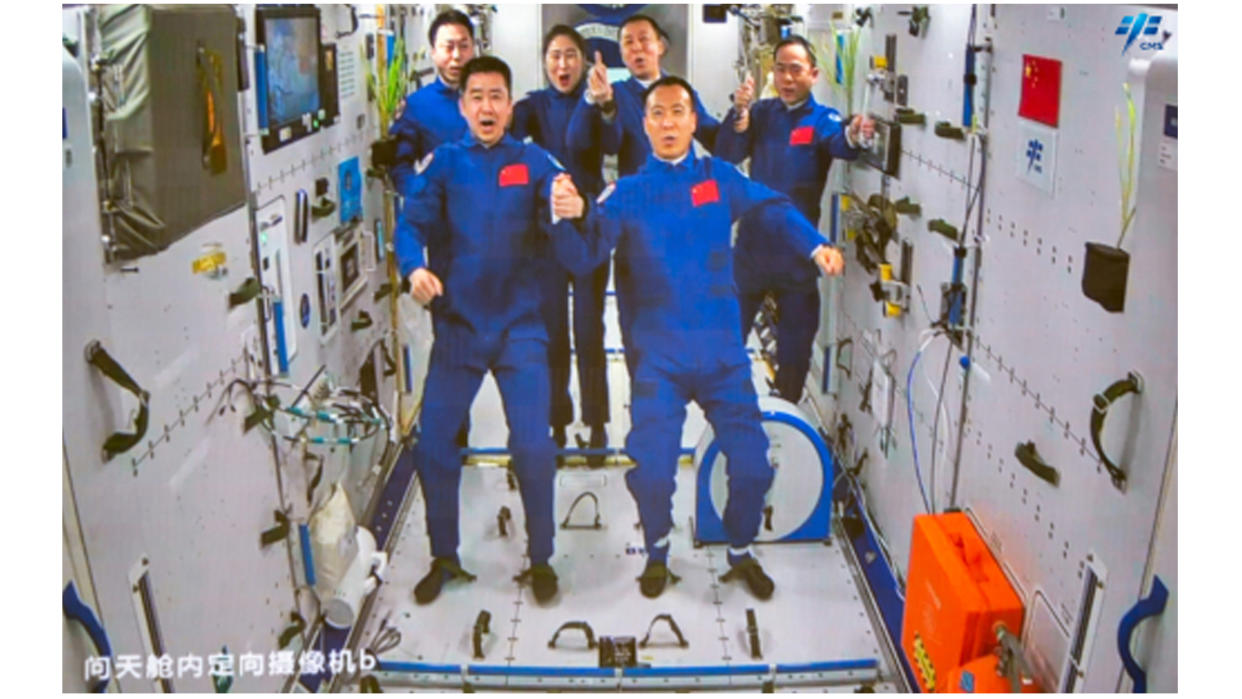  The six astronauts of China's Shenzhou 14 and Shenzhou 15 missions to the Tiangong space station pose for a crew photo in orbit in November 2022. 