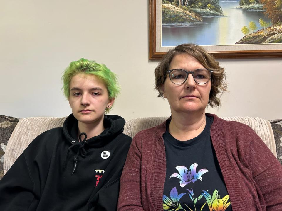 Roberta Cain, right, says she worries about the future of her 15-year-old trans son, Silas Cain, left, in Saskatchewan. 