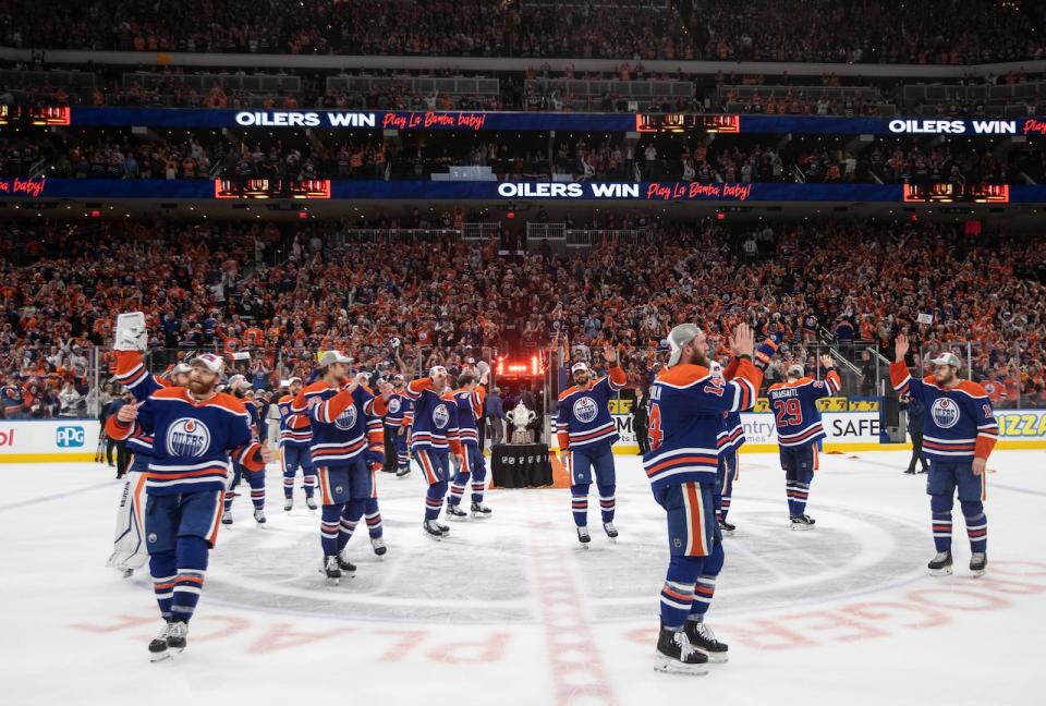 The Edmonton Oilers celebrate their 2-1 win over the Dallas Stars in Game 6 of the Western Conference finals of the NHL Stanley Cup playoffs in Edmonton on Sunday.