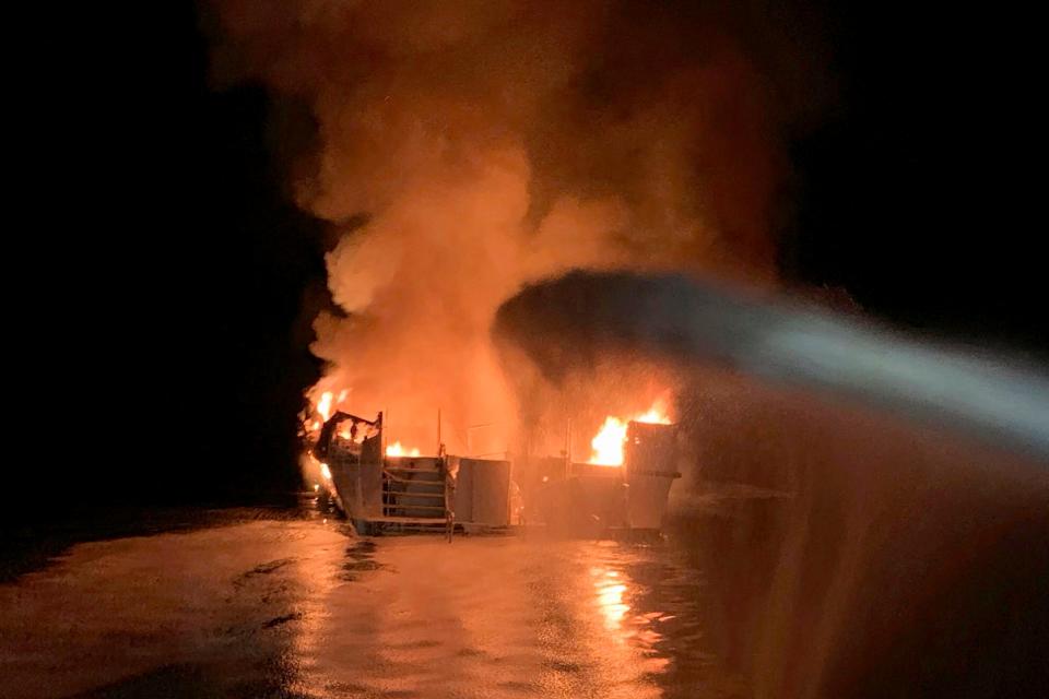 Firefighters respond to a fire aboard the Conception dive boat fire in the Santa Barbara Channel off the coast of Southern California on Sept. 2, 2019. The fire killed 34 people and the trial against Conception Capt. Jerry Boylan began in federal court in Los Angeles on Tuesday, Oct. 24, 2023.