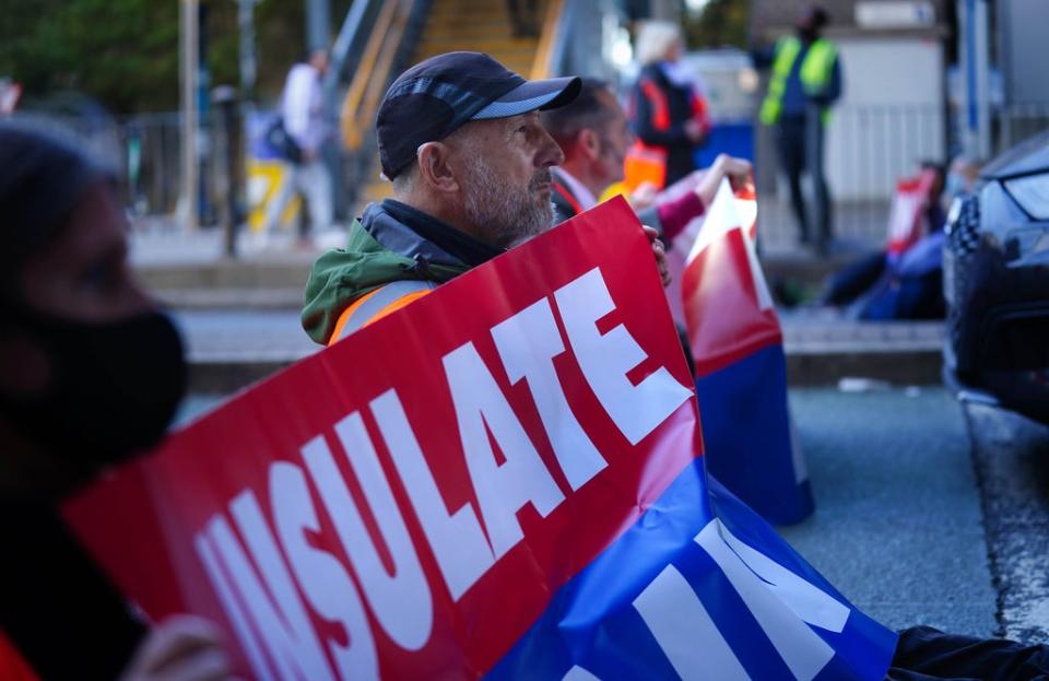 Protesters from Insulate Britain blocking Canary Wharf (Victoria Jones/PA) (PA Wire)