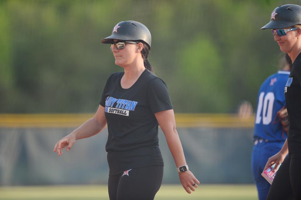 The McDowell Lady Titans softball team’s head coach, Catriona Young, in the game against the Enka Sugar Jets in Candler, April 23, 2024.