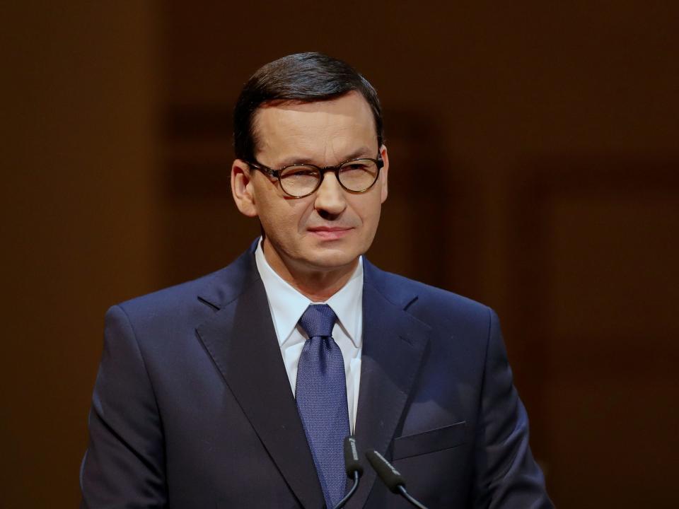 FILE PHOTO: Polish Prime Minister Mateusz Morawiecki speaks at a memorial concert to commemorate the 75th anniversary of the liberation of the German Nazi death camp Auschwitz at the State Opera in Berlin, Germany, January 27, 2020.     Odd Andersen/Pool via REUTERS/File Photo