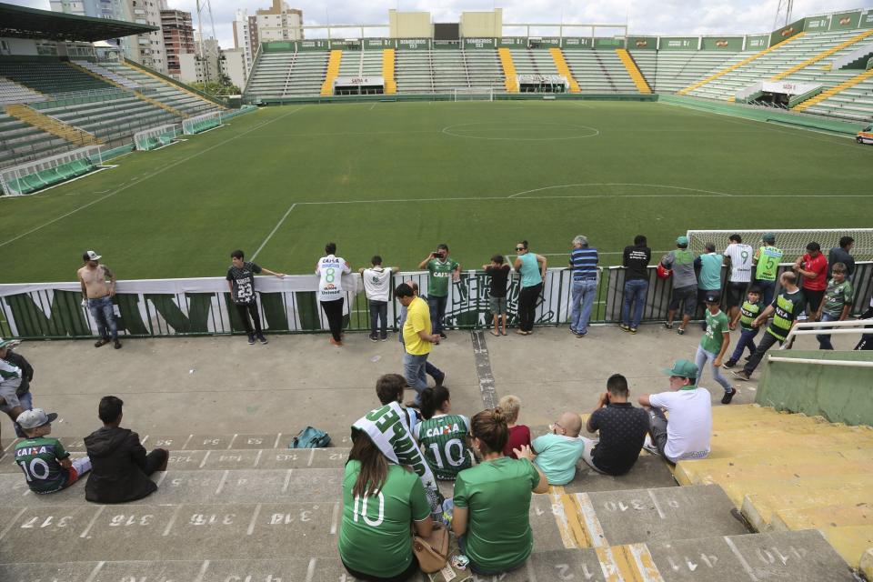 <p>Fans of Brazil’s soccer team Chapecoense gather outside the Arena Conda stadium in Chapeco, Brazil, Tuesday, Nov. 29, 2016. A chartered plane that was carrying the Brazilian soccer team to the biggest match of its history crashed into a Colombian hillside and broke into pieces, killing 75 people and leaving six survivors, Colombian officials said Tuesday. (AP Photo/Andre Penner) </p>