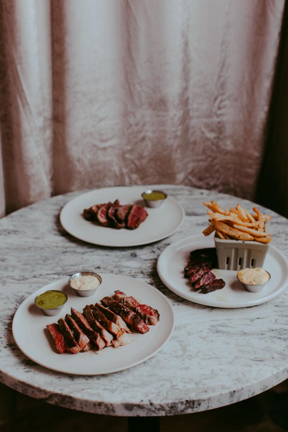 Steak frites at Nostalgic, which opens next to the Bellwether Hotel on Feb. 14.