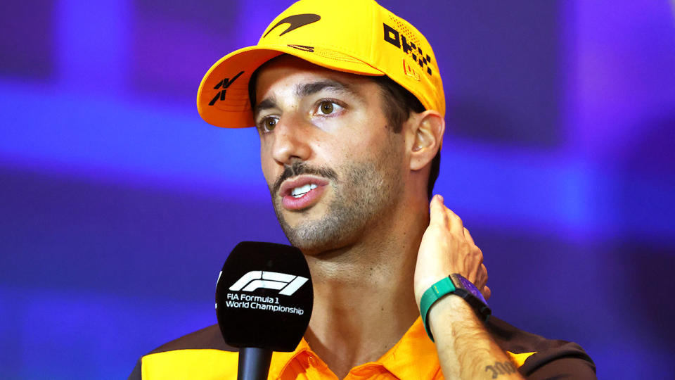 Daniel Ricciardo speaks at a press conference at the 2022 Abu Dhabi Grand Prix.