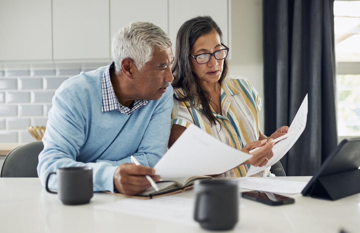 Retirement doesn’t just lead to concerns about money. It also raises questions about one’s usefulness in the world. <a href="https://www.gettyimages.com/detail/photo/couple-reviewing-finances-royalty-free-image/1887469204?phrase=retirement&adppopup=true" rel="nofollow noopener" target="_blank" data-ylk="slk:LaylaBird/E+ via Getty images;elm:context_link;itc:0;sec:content-canvas" class="link ">LaylaBird/E+ via Getty images</a>