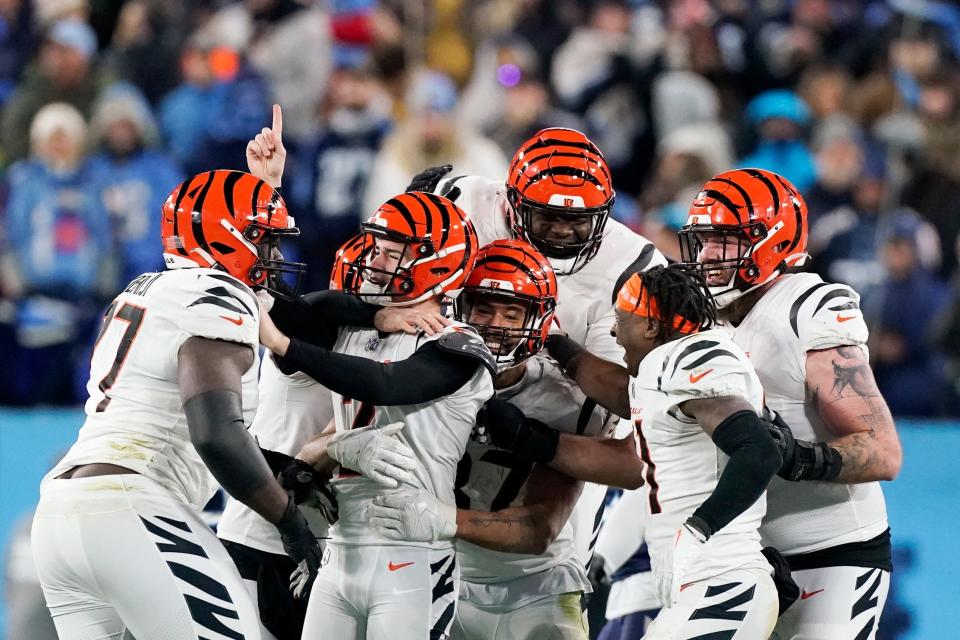 Cincinnati Bengals kicker Evan McPherson (2) celebrates his game-winning field goal against the Tennessee Titans after an NFL divisional round playoff football game, Saturday, Jan. 22, 2022, in Nashville, Tenn.