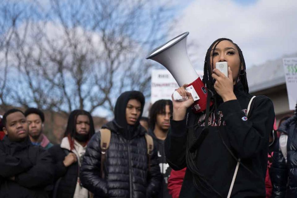 Then-junior Dynah Mosley speaks on a megaphone, claiming campus police at Delaware State University are concerned more with students smoking cannabis than them getting sexually assaulted, during a protest at DSU on Wednesday, Jan. 18, 2023.