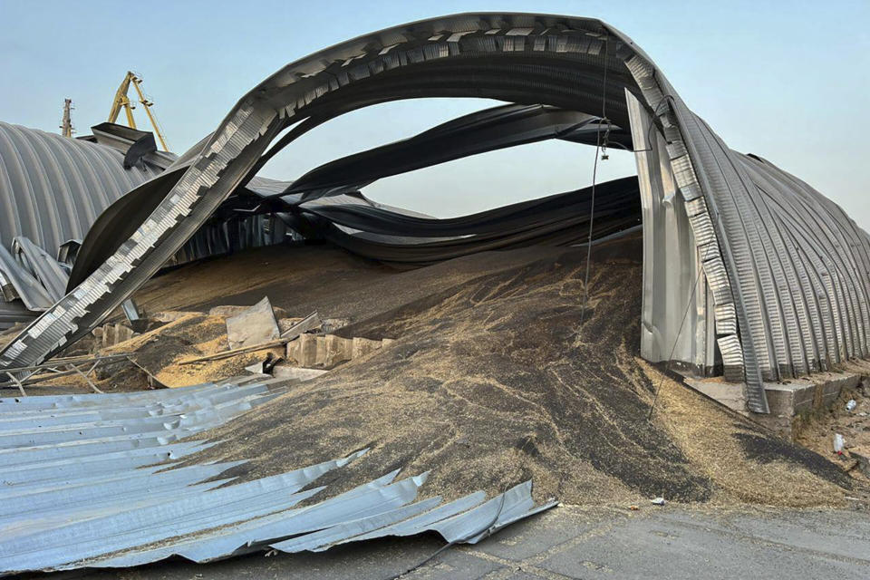 In this photo provided by the Odesa Regional Administration Press Office, a granary destroyed in a Russian drone attack at night is seen in a Danube port near Odesa, Ukraine, early hours Wednesday, Aug. 16, 2023. (Odesa Regional Administration Press Office via AP)