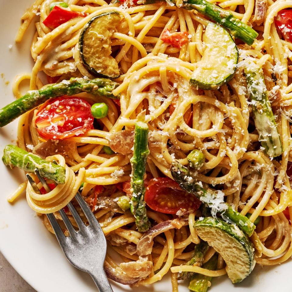 pasta primavera with zucchini asparagus onion leeks garlic tomato cream lemon parmesan