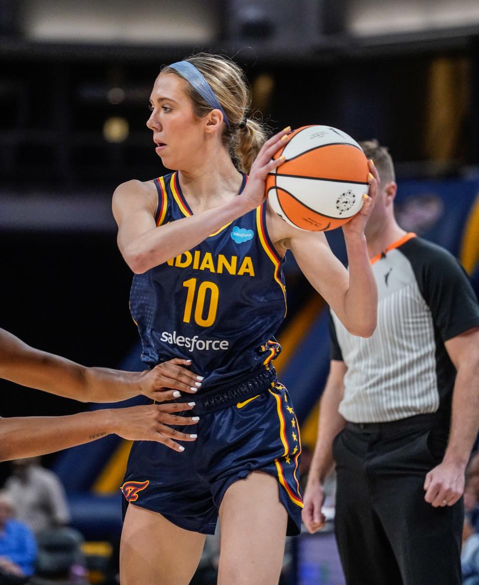 The Indiana Fever's Lexie Hull (10) looks to pass during a game between the Indiana Fever and the Los Angeles Sparks on Sunday, May 8, 2022, at Gainbridge Fieldhouse in Indianapolis. 