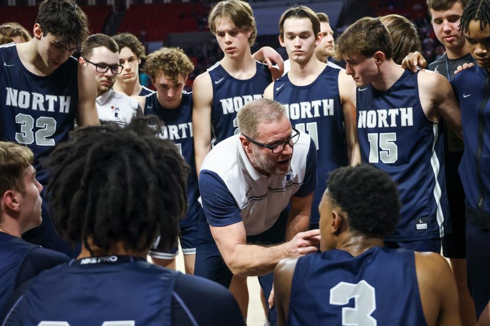Edmond North's head coach Scott Norris talks to players during the boys high school basketball championship game between Broken Arrow and Edmond North at the Lloyd Noble Center in Norman, Okla., on Saturday, March 11, 2023. 