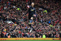 <p>United keeper David de Gea celebrates his side going 2-0 up </p>