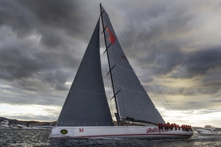 This photo, taken on December 28, 2012 and released by Rolex, shows supermaxi Wild Oats XI arriving in Hobart to complete the Rolex Sydney to Hobart Yacht Race. Wild Oats XI smashed her own record time in taking line honours ahead of Ragamuffin-Loyal in the gruelling race