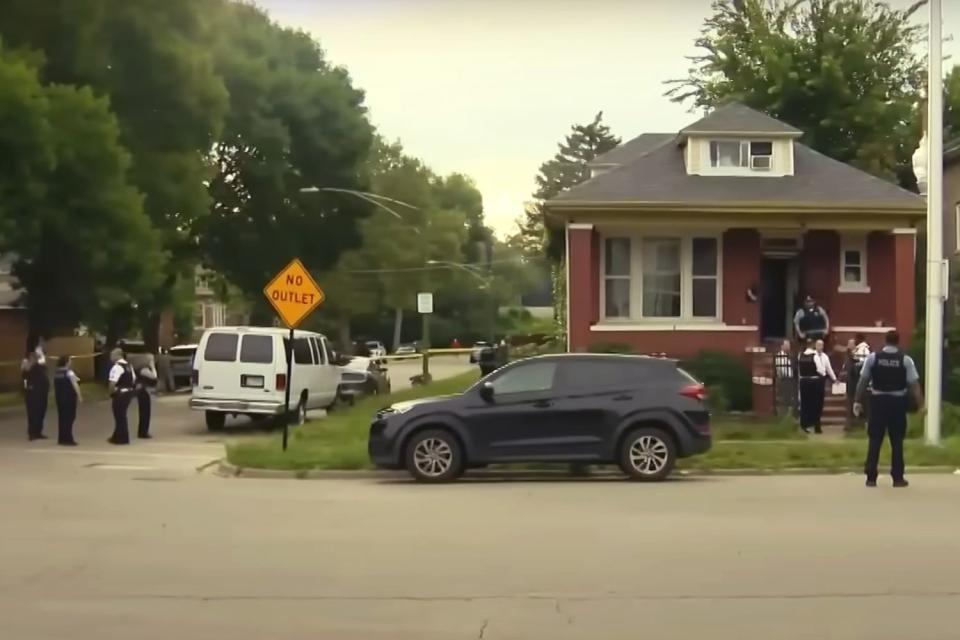 <p>CBS Chicago/YouTube</p> Police investigating the scene.