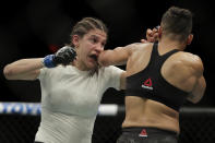 Sijara Eubanks, right, fights against Roxanne Modafferi during the second round of a women's flyweight mixed martial arts bout at UFC 230, Saturday, Nov. 3, 2018, at Madison Square Garden in New York. (AP Photo/Julio Cortez)