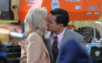 Leonardo DiCaprio and Joanna Lumley kiss while filming 'The Wolf Of Wall Street' in Prospect Park, New York.