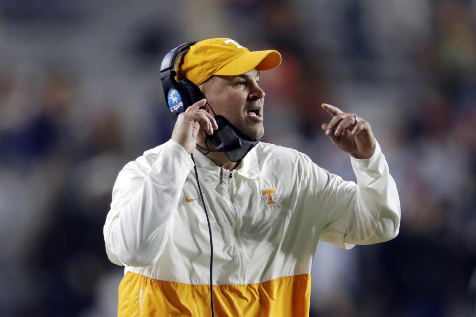 FILE - Tennessee coach Jeremy Pruitt calls out to his players during the first half of an NCAA college football game against Auburn in Aubuen, Ala., in this Saturday, Nov. 21, 2020, in file photo. Tennessee fired Pruitt Monday, Jan. 18, 2021. (AP Photo/Butch Dill, File)