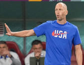 FILE - United States head coach Gregg Berhalter gestures during the World Cup round of 16 soccer match against the Netherlands at Khalifa International Stadium in Doha, Qatar, Dec. 3, 2022. United States women’s coach Vlatko Andonovski earned 27% as much as men’s coach Berhalter in the year ending last March 31, down slightly from 28% in the previous year. (AP Photo/Ebrahim Noroozi, File)