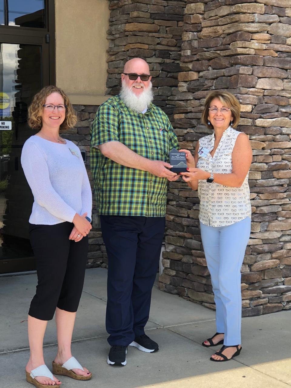 From left to right are Erika Lee, Advancement Director at Cornerstone VNA, Mark Farrell, Director of Manufacturing Operations at Laars, and Julie Reynolds, President/CEO at Cornerstone VNA.