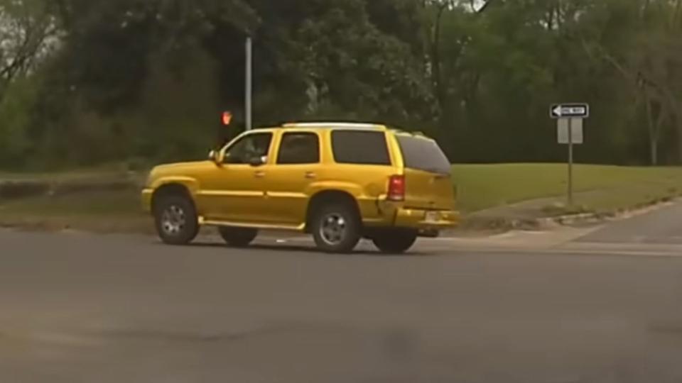 Flashy Gold Cadillac Escalade Tries Running From The Police