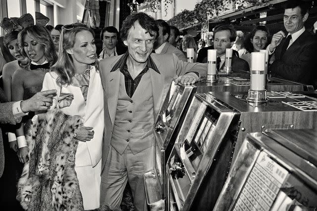 <p>Derek Hudson/Getty</p> Hugh Hefner and Sondra Theodore in 1981