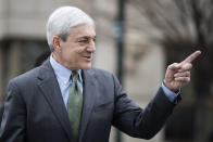 Former Penn State president Graham Spanier gestures as he walks from the Dauphin County Courthouse in Harrisburg, Pa., Friday, March 24, 2017. Spanier was convicted Friday of hushing up suspected child sex abuse in 2001 by Jerry Sandusky, whose arrest a decade later blew up into a major scandal for the university and led to the firing of beloved football coach Joe Paterno. (AP Photo/Matt Rourke)