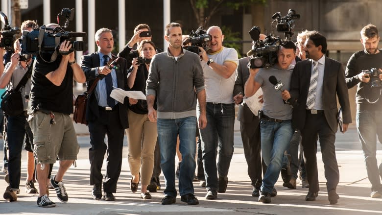 Alexander (Sandro) Lisi, the friend and occasional driver of Mayor Rob Ford, is shown following a bail hearing in Toronto in October. Lisi and Ford are mentioned in police documents that had been under a publication ban until a judge lifted it Thursday.