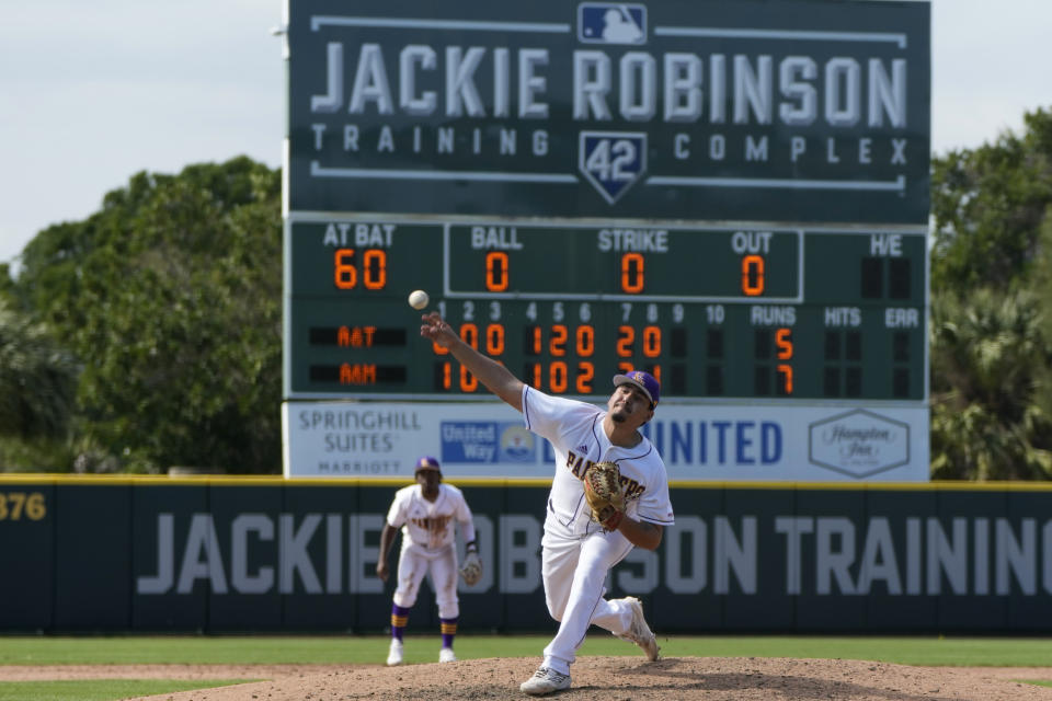 Prairie View A&M University pitcher Victor Mendoza throws during a college baseball game against North Carolina A&T State University at the Andre Dawson Classic tournament, Friday, Feb. 23, 2024, at the Jackie Robinson Training Complex, in Vero Beach, Fla. The percentage of Black major league players has been declining for decades and remains historically low, but there are signs of improvement in the league's player development pipeline. (AP Photo/Lynne Sladky)