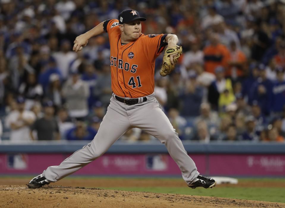 Brad Peacock throws during the third inning of Game 7 of the World Series. (AP)