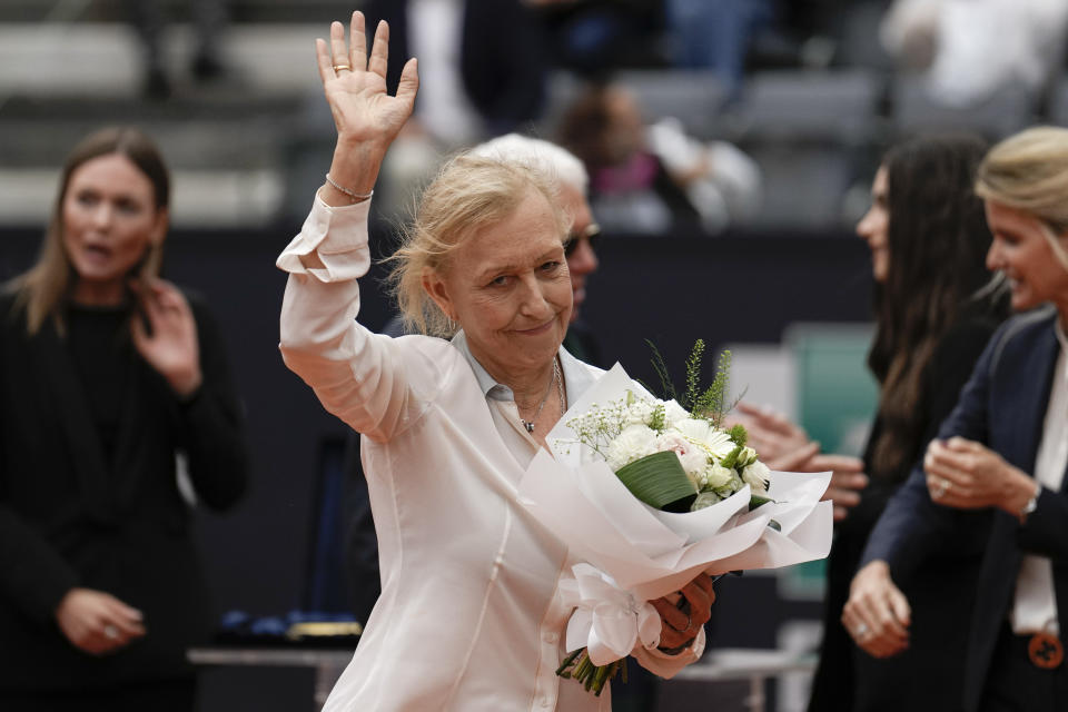 Martina Navratilova, the 18-time Grand Slam singles champion and member of the International Tennis Hall of Fame, waves after receiving the Racchetta d'Oro (Golden Racket) award from the Italian Tennis Federation ahead of the men's final tennis match at the Italian Open tennis tournament in Rome, Italy, Sunday, May 21, 2023. (AP Photo/Alessandra Tarantino)