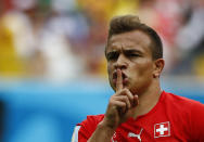 Switzerland's Xherdan Shaqiri celebrates after scoring a goal during the 2014 World Cup Group E soccer match between Honduras and Switzerland at the Amazonia arena in Manaus June 25, 2014. REUTERS/Michael Dalder (BRAZIL - Tags: TPX IMAGES OF THE DAY SOCCER SPORT WORLD CUP)