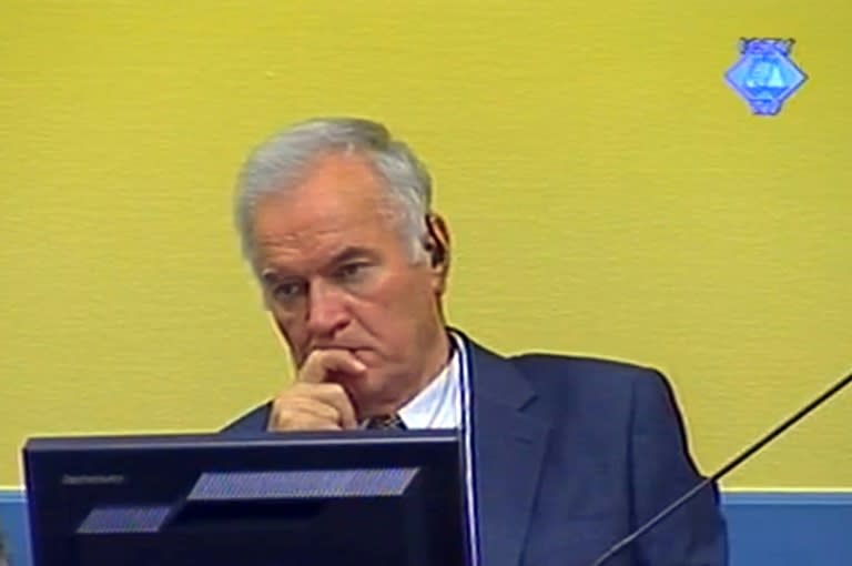 Ratko Mladic listening to the first prosecution witness in The Hague courtroom back in July 2012