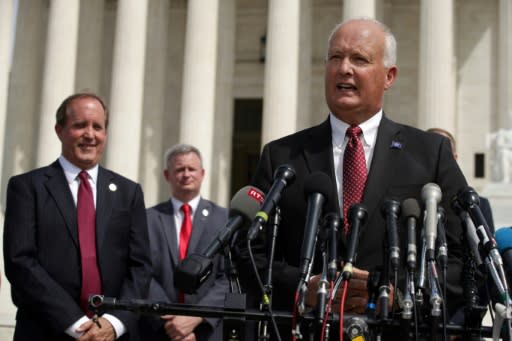 Nebraska Attorney General Doug Peterson (R) joins state officials announcing a preliminary probe of whether Google has abused its monopoly power