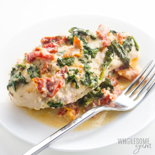 <p><a href="https://www.wholesomeyum.com/crock-pot-creamy-tuscan-garlic-chicken-recipe/" rel="nofollow noopener" target="_blank" data-ylk="slk:Wholesome Yum" class="link ">Wholesome Yum</a></p>