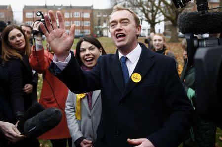Liberal Democrats winner of the Richmond Park by-election, Sarah Olney (C), celebrates her victory with party leader Tim Farron on Richmond Green in London, Britain December 2, 2016. REUTERS/Peter Nicholls