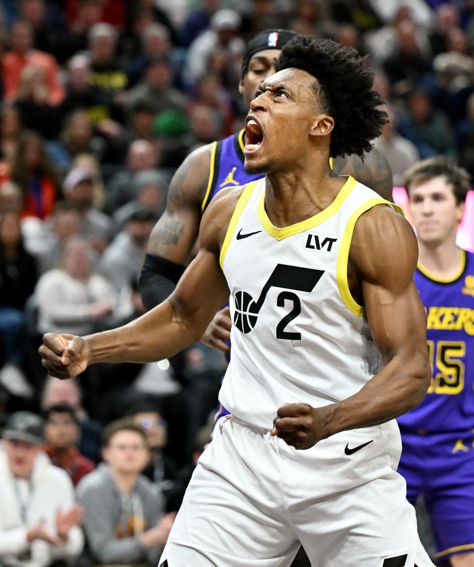 Utah Jazz guard <a class="link " href="https://sports.yahoo.com/nba/players/6019" data-i13n="sec:content-canvas;subsec:anchor_text;elm:context_link" data-ylk="slk:Collin Sexton;sec:content-canvas;subsec:anchor_text;elm:context_link;itc:0">Collin Sexton</a> (2) celebrates after a hard-fought layup as Utah and Los Angeles play at the Delta Center in Salt Lake City on Saturday, Jan. 13, 2024. | Scott G Winterton, Deseret News