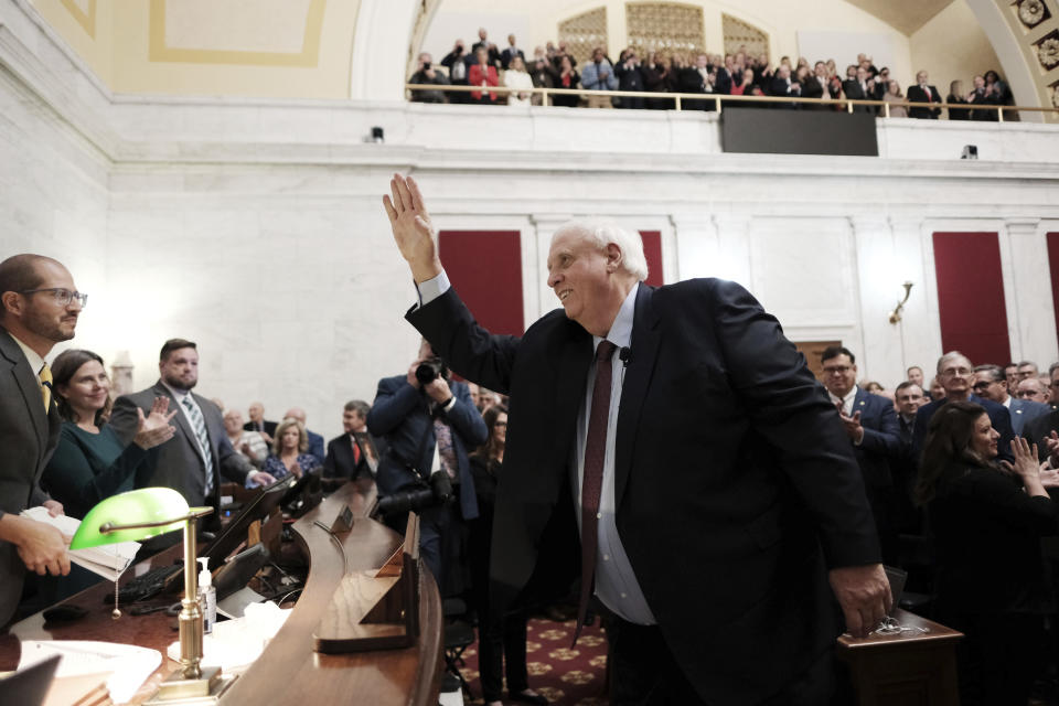 West Virginia Gov. Jim Justice waves prior to delivering the State of the State address in Charleston, W.Va., on Wednesday, Jan. 10, 2024. (AP Photo/Chris Jackson)