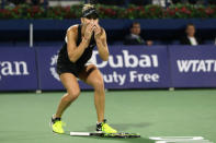 Tennis - WTA Premier 5 - Dubai Tennis Championships - Dubai Duty Free Tennis Stadium, Dubai, United Arab Emirates - February 23, 2019 Switzerland's Belinda Bencic celebrates winning the final against Czech Republic's Petra Kvitova REUTERS/Ahmed Jadallah