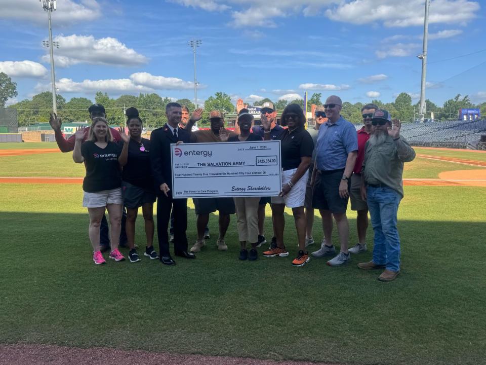 Entergy Mississippi employees present The Salvation Army with $425,000 contribution to The Power to Care bill assistance program.