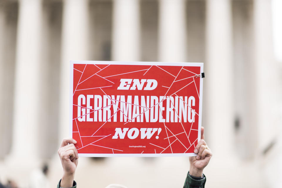 Gerrymandering activists gather on the steps of the Supreme Court as the court prepares to hear the the Benisek v. Lamone case on March 28, 2018. (Photo: Bill Clark/CQ Roll Call/Getty Images)