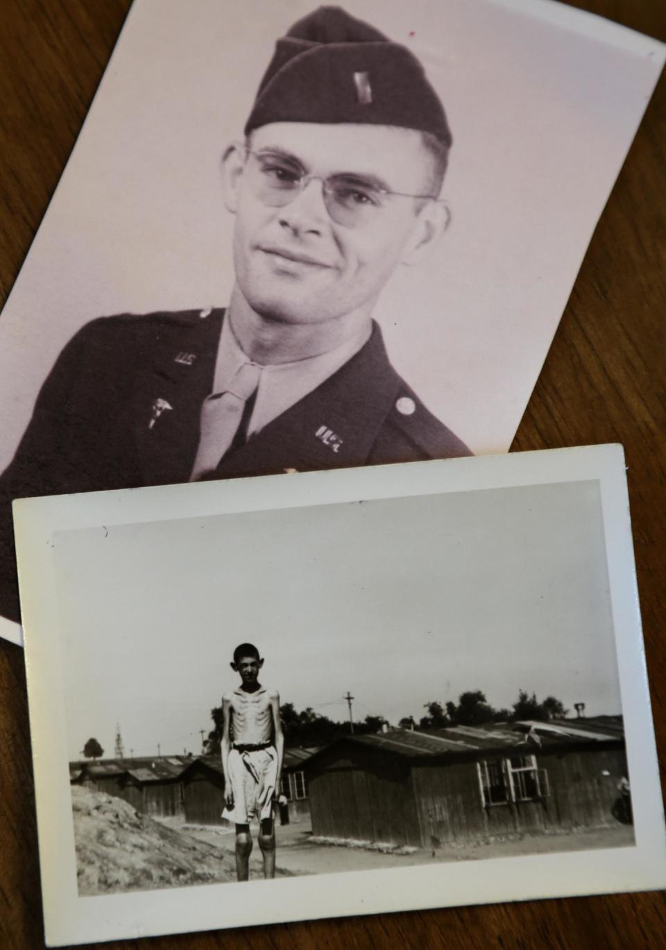 In this Tuesday, April 2, 2013 photo a World War II era photo of U.S. Army medic Donald Johnson, top, lies next to a 1945 photograph taken by Johnson that shows a boy in what is believed to be the Nazi Mauthausen concentration camp, at the home of filmmaker Matthew Nash, in Boston. Nash's discovery of photographs by Johnson, his grandfather, led him to create a documentary about the liberation of the Ohrdruf concentration camp in Germany, the first that the Americans found. (AP Photo/Steven Senne)