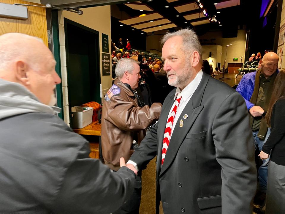 Republican Rep. Tim Ramthun, right, greets supporters at a rally for his campaign for governor held Saturday, Feb. 12, 2022, in the auditorium of Kewaskum High School.