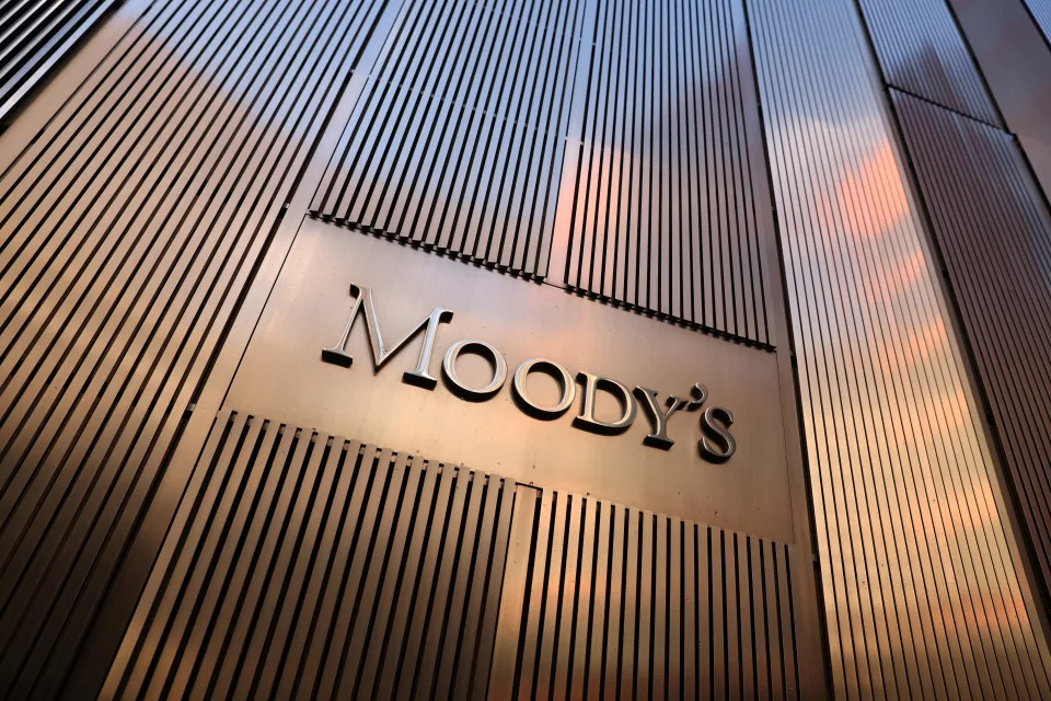 Signage is seen outside the Moody's Corporation headquarters in Manhattan, New York, U.S., November 12, 2021. REUTERS/Andrew Kelly