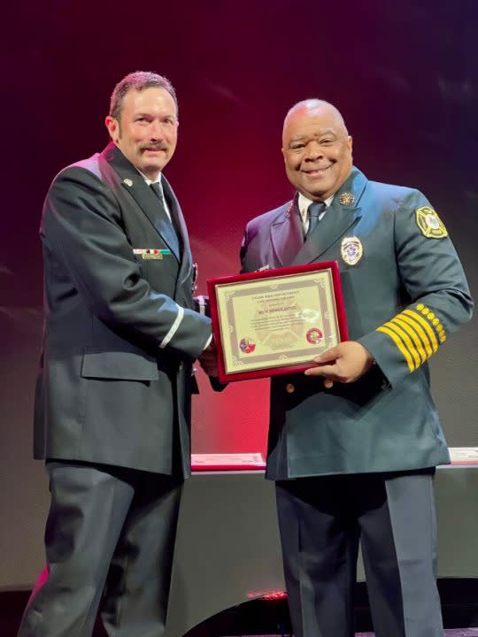 Engineer Ben Missildine accepting a Lifesaving Award, courtesy of the City of Tyler