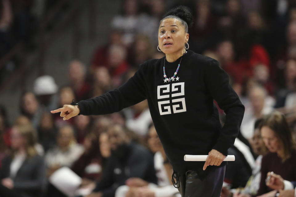 South Carolina head coach Dawn Staley gives instructions to her team during the first half of an NCAA college basketball game against Georgia, Sunday, Feb. 18, 2024, in Columbia, S.C. (AP Photo/Artie Walker Jr.)
