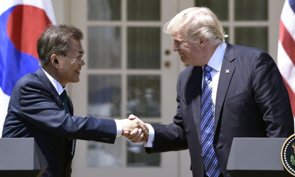 Donald Trump shakes hands with South Korea’s president, Moon Jae-in, in August.