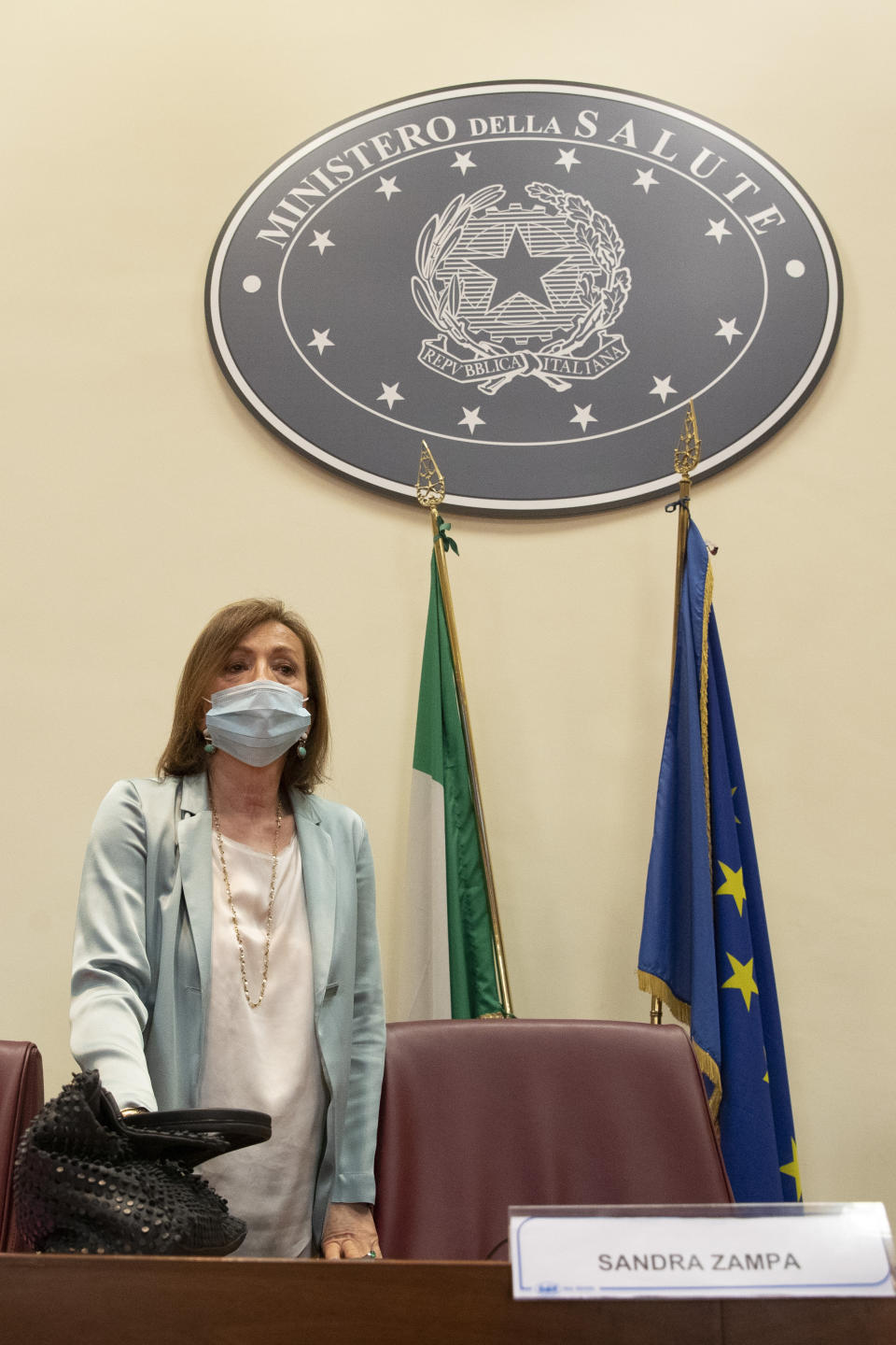 Sandra Zampa, Health Ministry Undersecretary arrives for a press conference at the Italian Health Ministry to present the results of an investigation on the psychological and behavioral impact the coronavirus lockdown has had on children and adolescents in Italy, in Rome, Tuesday, June 16, 2020. (AP Photo/Alessandra Tarantino)