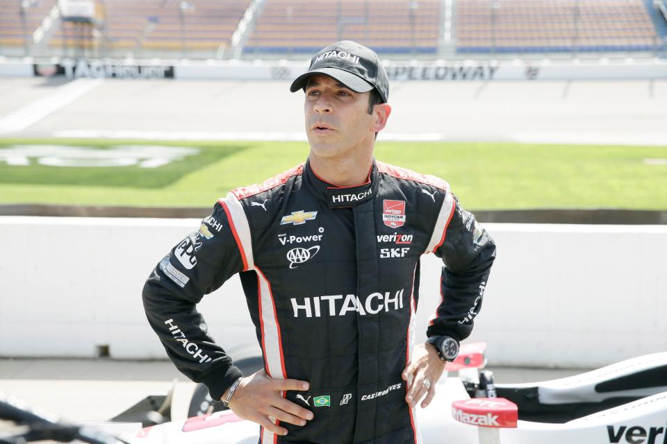 Helio Castroneves looks on during qualifying for the IndyCar Series auto race Saturday, July 18, 2015, at Iowa Speedway in Newton, Iowa. (AP Photo/Charlie Neibergall)